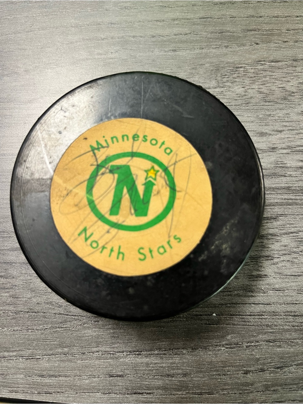 Minnesota North Stars Vintage Hockey Puck - signed by Bill Goldsworthy